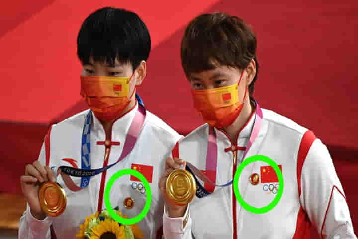 China’s gold medallists under Olympics panel scanner for wearing Mao badges on podium