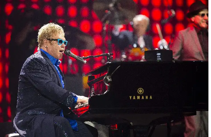 Music icon Elton John sings to raise awareness about vaccines, climate change