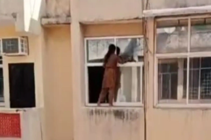 Reckless Ghaziabad housewife hangs outside fourth floor to clean window