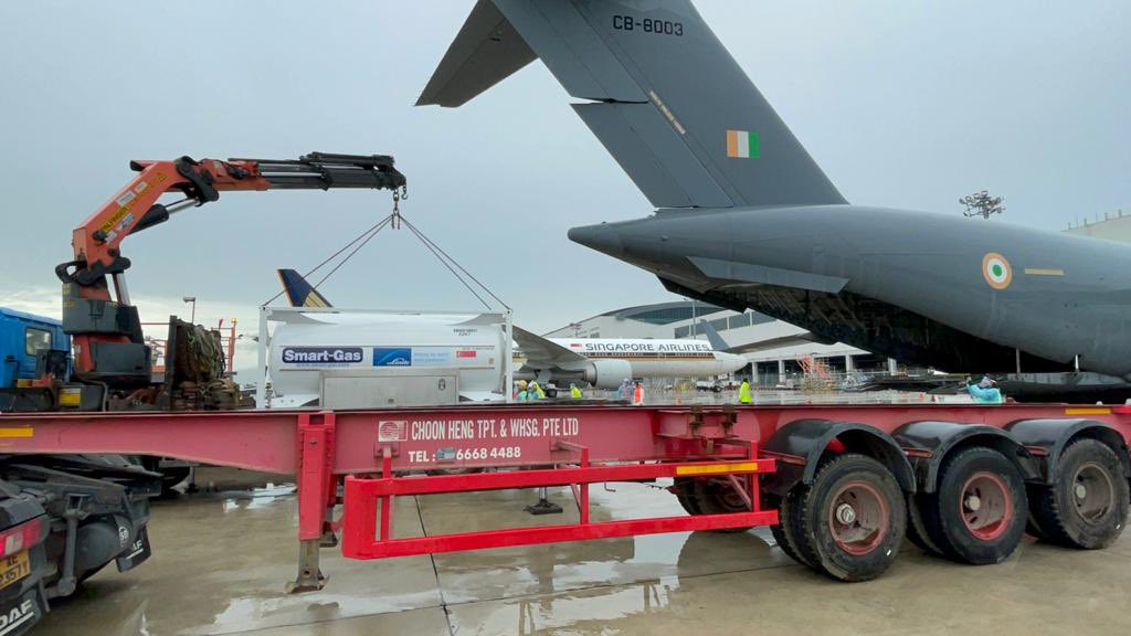 FIGHTBACK: Air Force transport plane ferries oxygen containers from Singapore