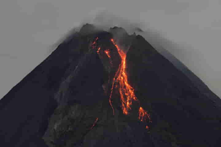 Spewing ash, hot gases and rocks, Mount Merapi blankets several villages and towns in Indonesia