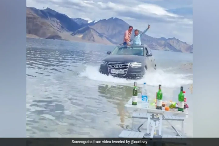 Video shocker: Drunk tourists drive around Audi in Ladakh’s pristine Pangong Lake