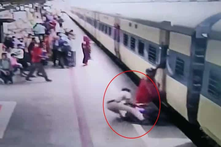 WATCH: Cop saves woman from being crushed by train at Bhubaneswar railway station in nick of time