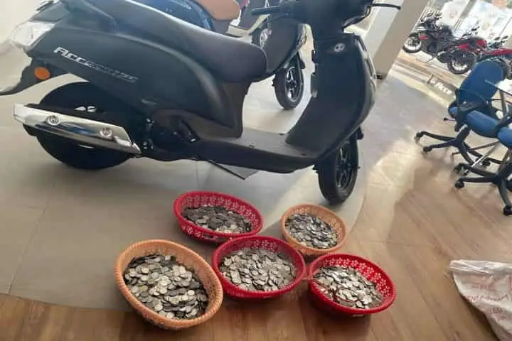 Viral Video: Assam shopkeeper buys scooter with a sack full of coins!