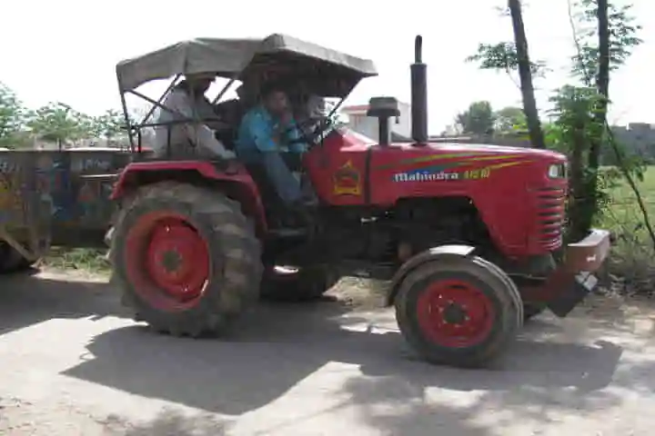 One armed tractor driver of Kunia village ferries three pregnant women to hospital despite flood