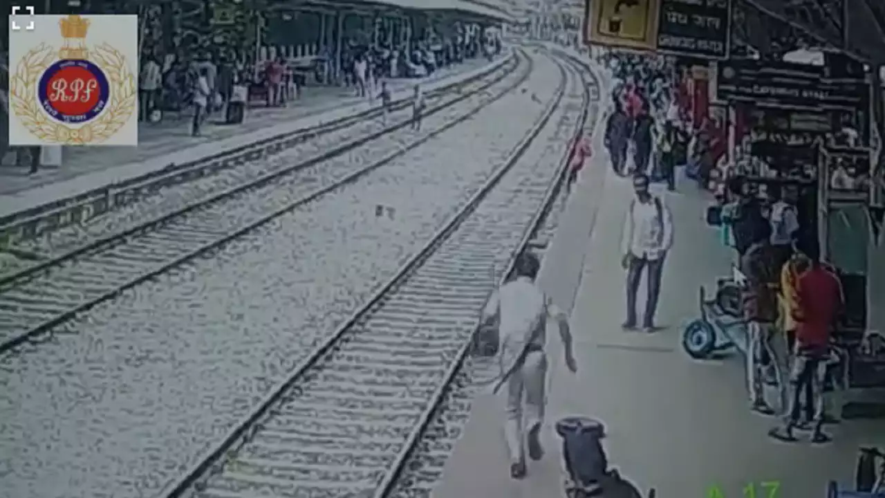 Alert railway cops save man from being crushed under train in nick of time at Bengaluru
