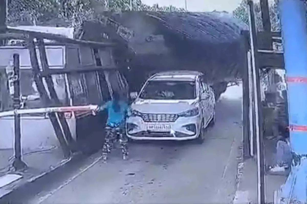Video: Young woman risks own life to save worker as speeding truck crashes into toll booth on Dehradun highway