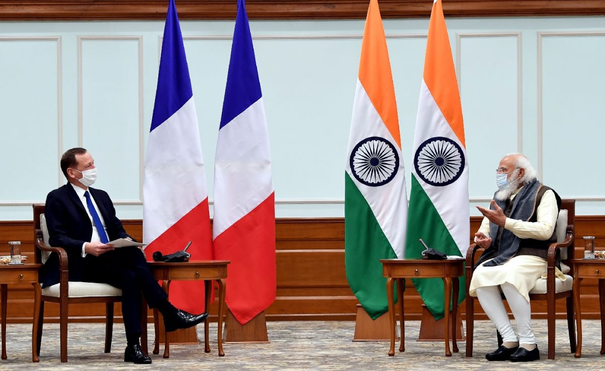 China’s muscle flexing brings France and India together