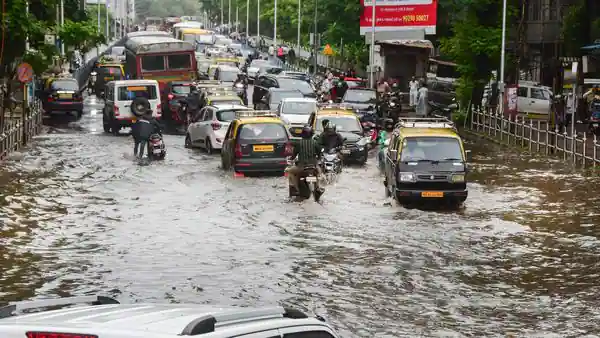 Heavy rains cripple Mumbai as monsoon gains momentum