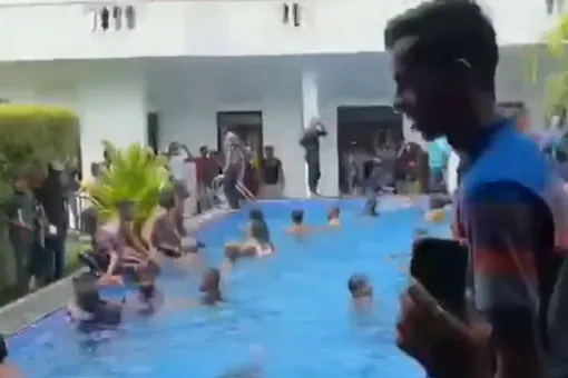 Video: Sri Lanka protesters taste snacks & beer in President’s kitchen, take a dip in swimming pool