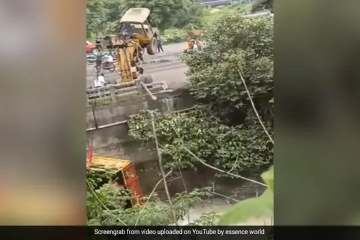 WATCH: Crane lifting truck out of river in Odisha comes toppling down from bridge