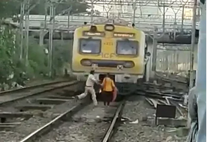 Video: Alert Railway cop saves woman from being crushed under local train in Mumbai 