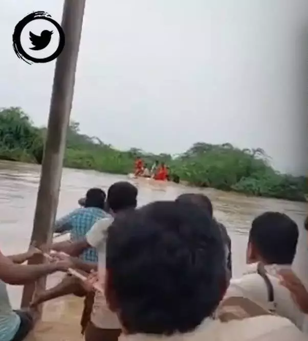 Video: Police team rescues two men stranded in Andhra flood