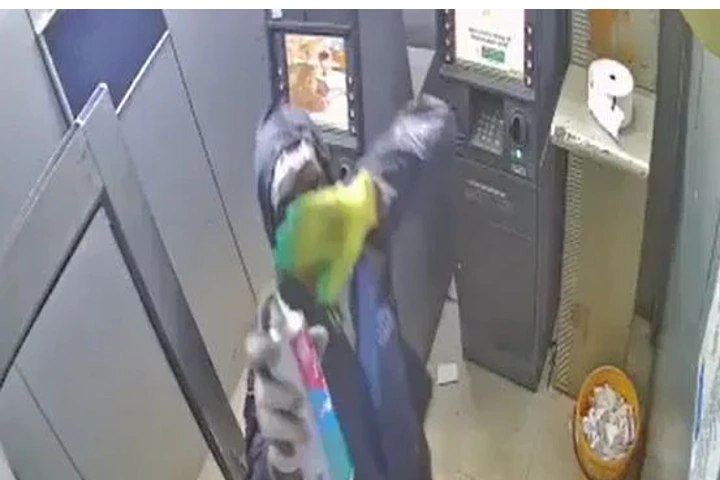 WATCH: Robber blasts ATM after spraying CCTV with black paint