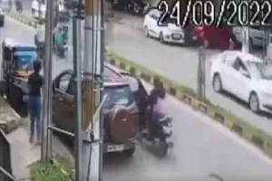 Video: Woman scooterist in Bengaluru run over as sudden opening of parked car door throws her on road