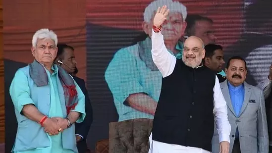WATCH:  Home Minister has bullet-proof glass removed at massive rally in Baramulla