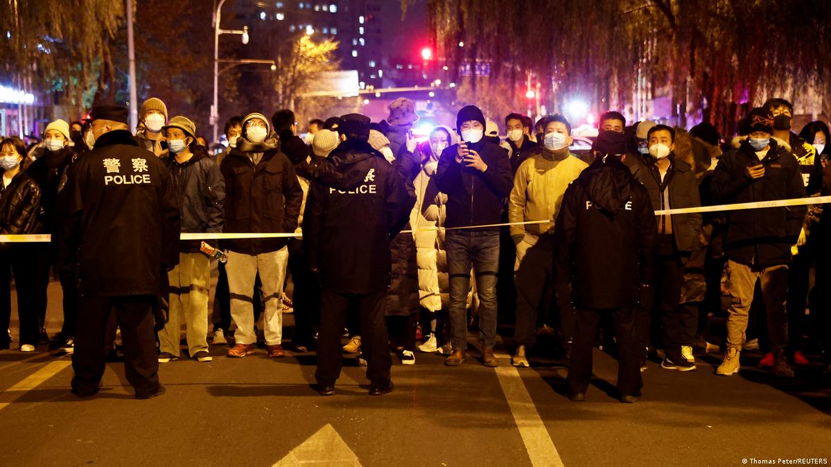 China warns of crack down as mass unrest spreads