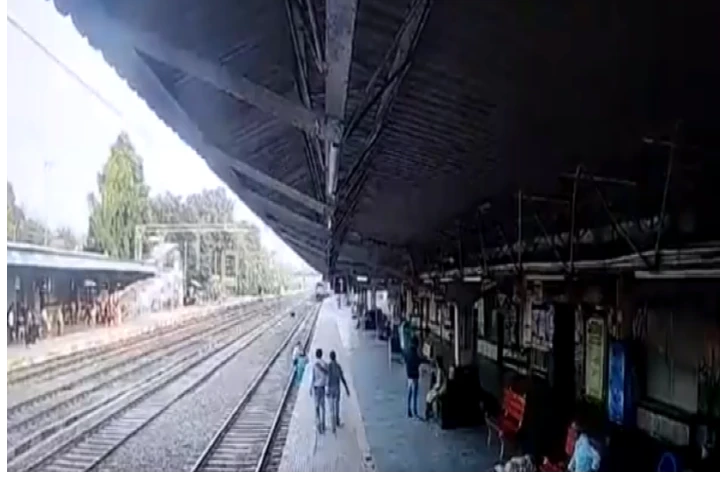 Video: Brave station master saves woman from being crushed by train in nick of time