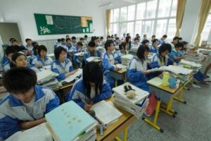 Shanghai shuts schools as Covid cases surge in China