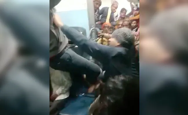 Caught on Camera: Railway ticket checkers brutally thrash traveller on train