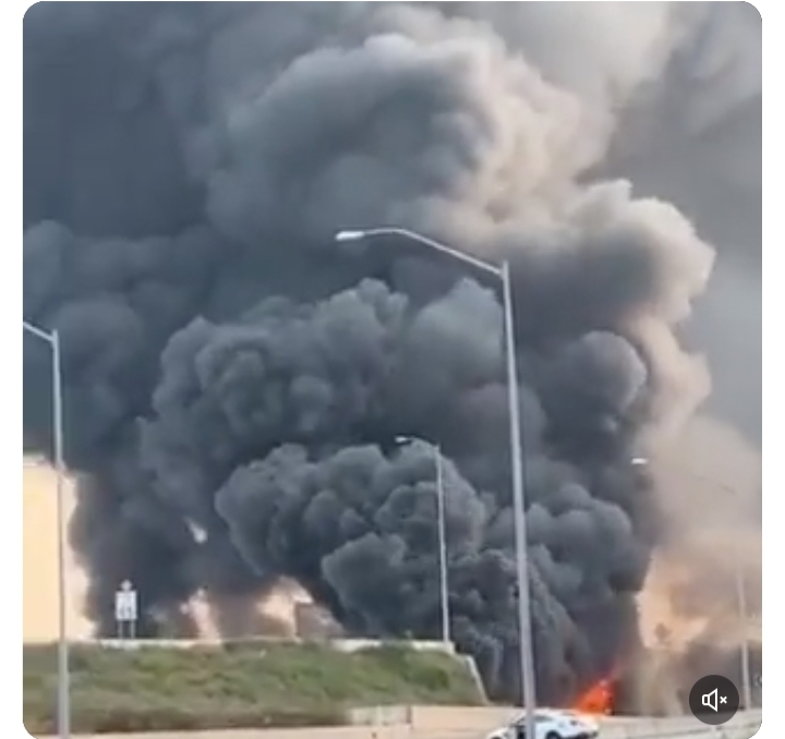 Watch: Burning truck brings down bridge on busy US highway